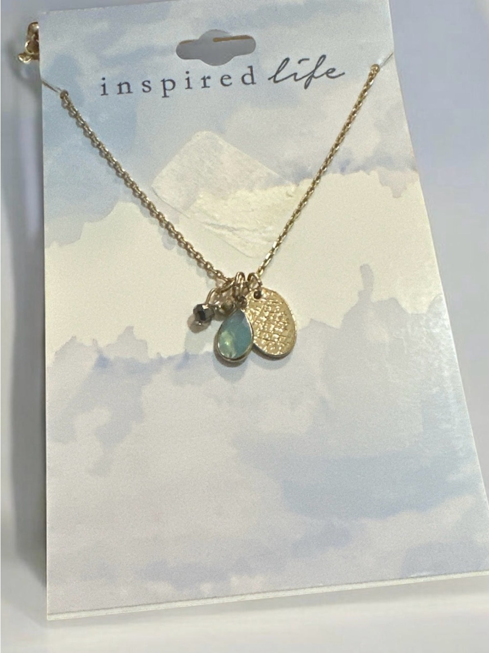 Inspire Gold Necklace with Aqua Teardrop and Textured Disc
1919